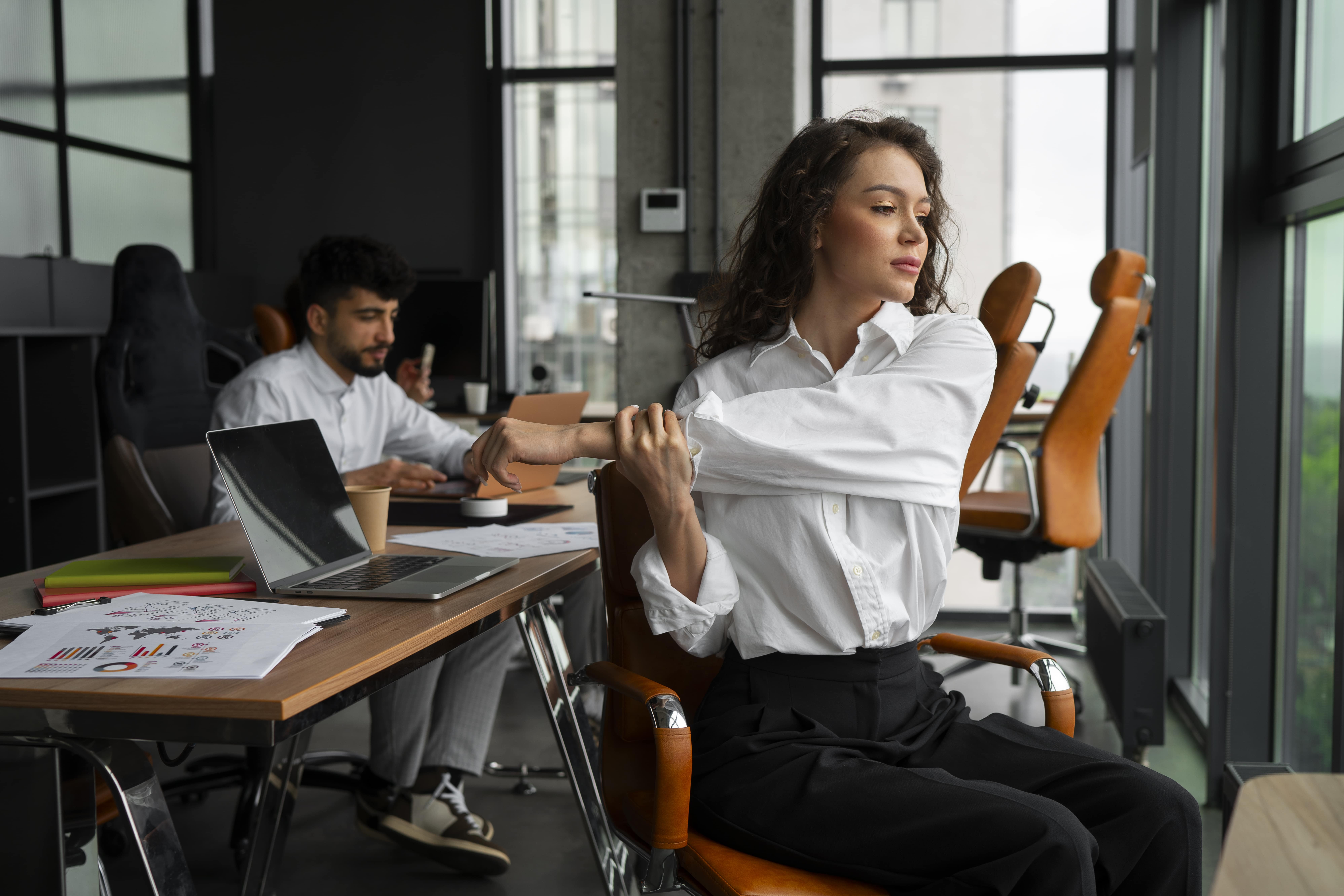 side-view-woman-stretching-work-min